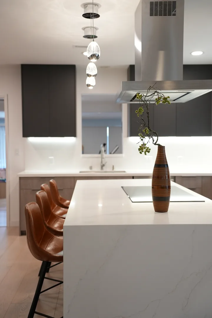 White waterfall island in the Van Nuys kitchen